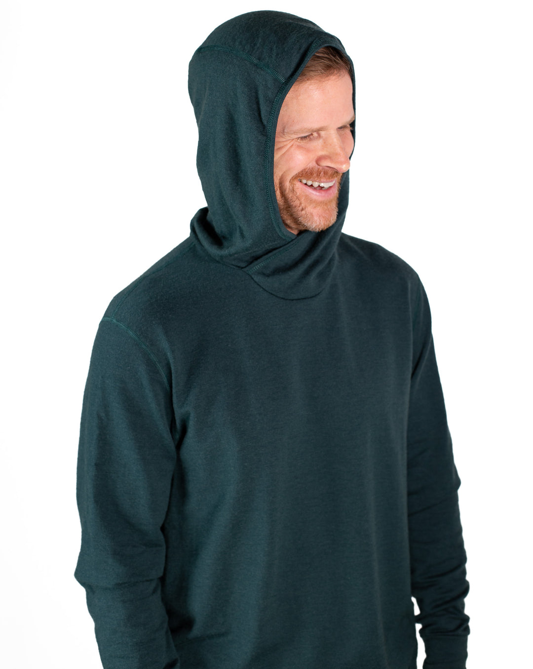 Man wearing a dark green hooded sweatshirt on a white background