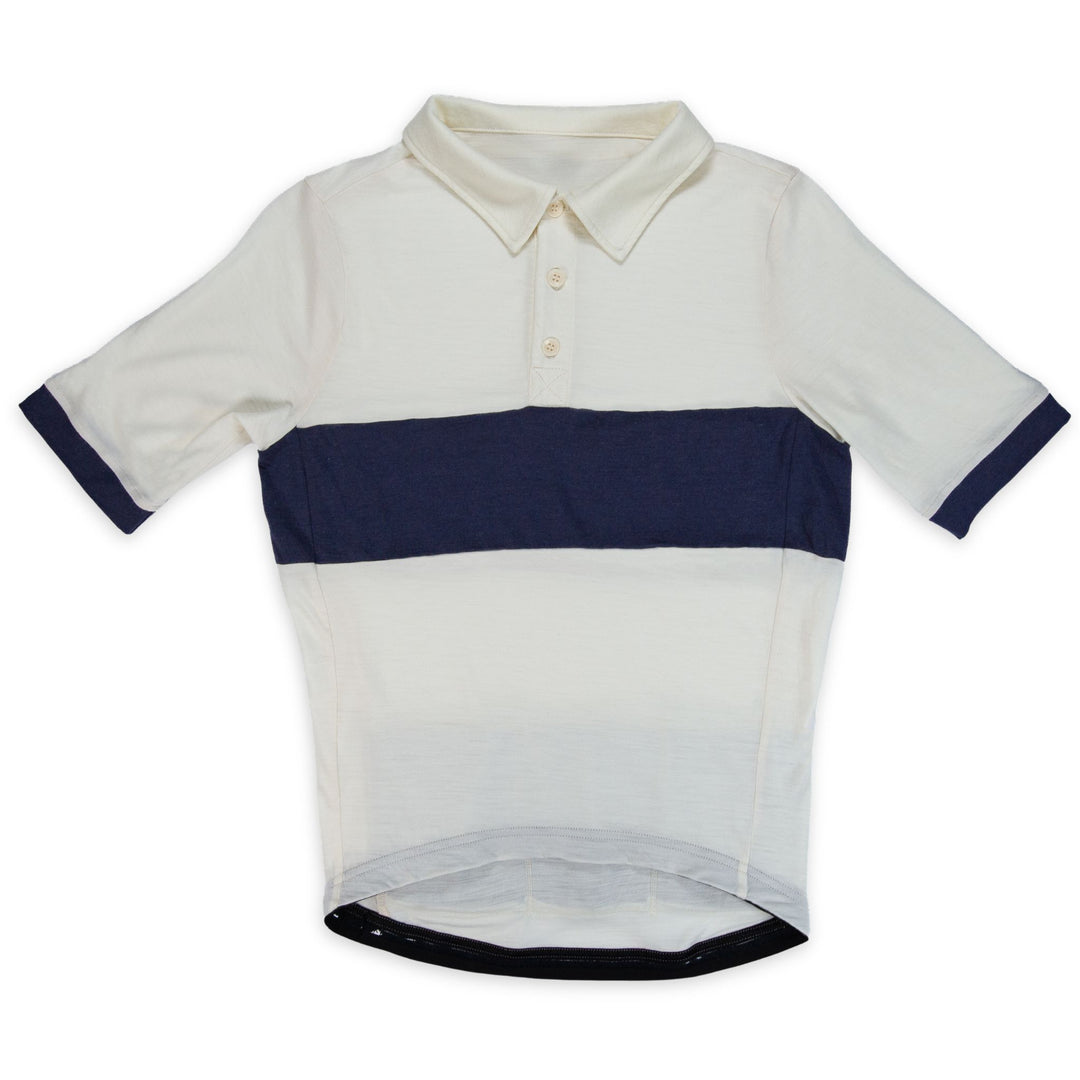 Natural cream merino wool cycling jersey with indigo contrast chest band and cuffs, three-button corozo placket and fold-down collar