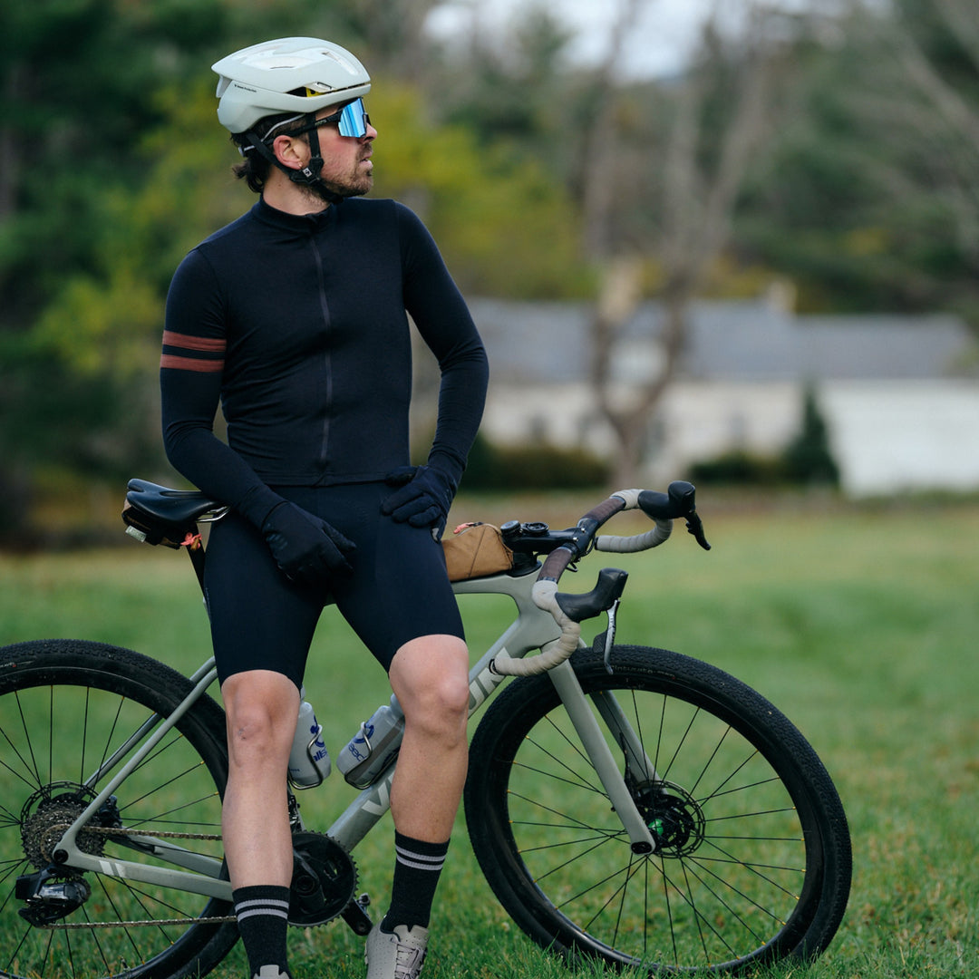 Pinebury Grafton Long Sleeve Merino Wool Cycling Jersey in Black, Man gravel cycling in Maine